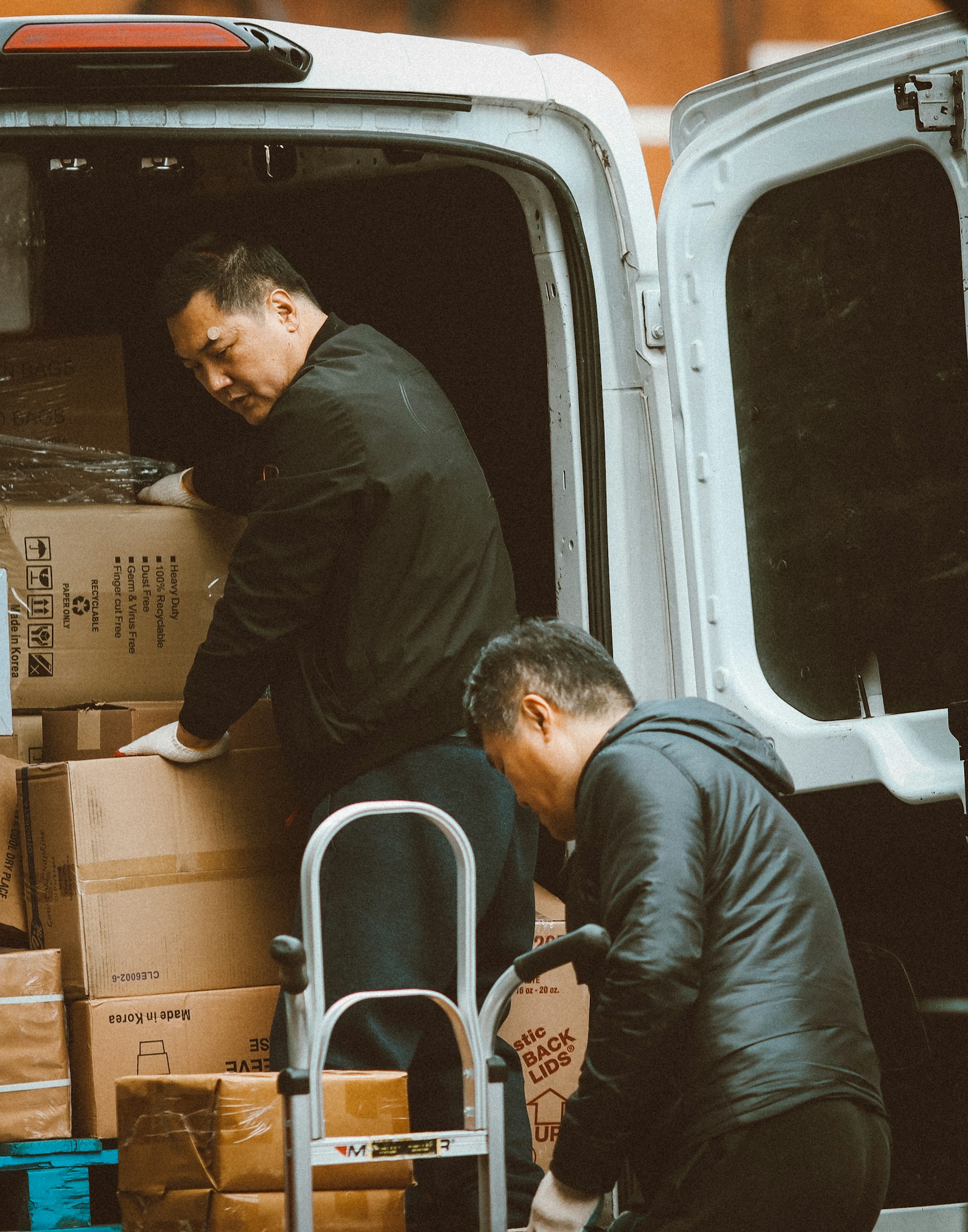 Anchor Movers crew carrying furniture